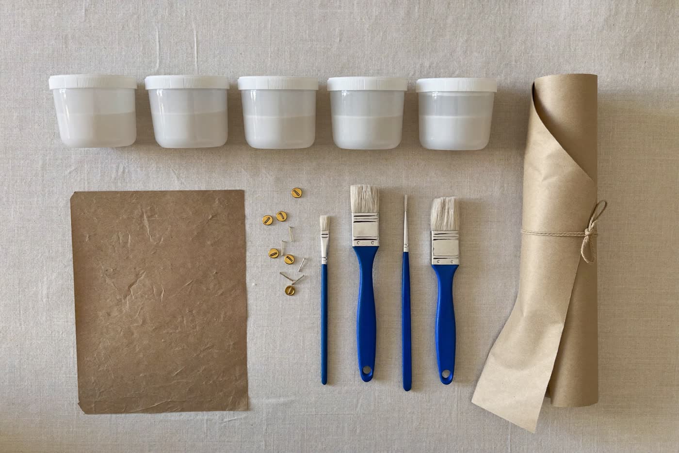 What's inside every kit — numbered paints, brushes, hanging pins